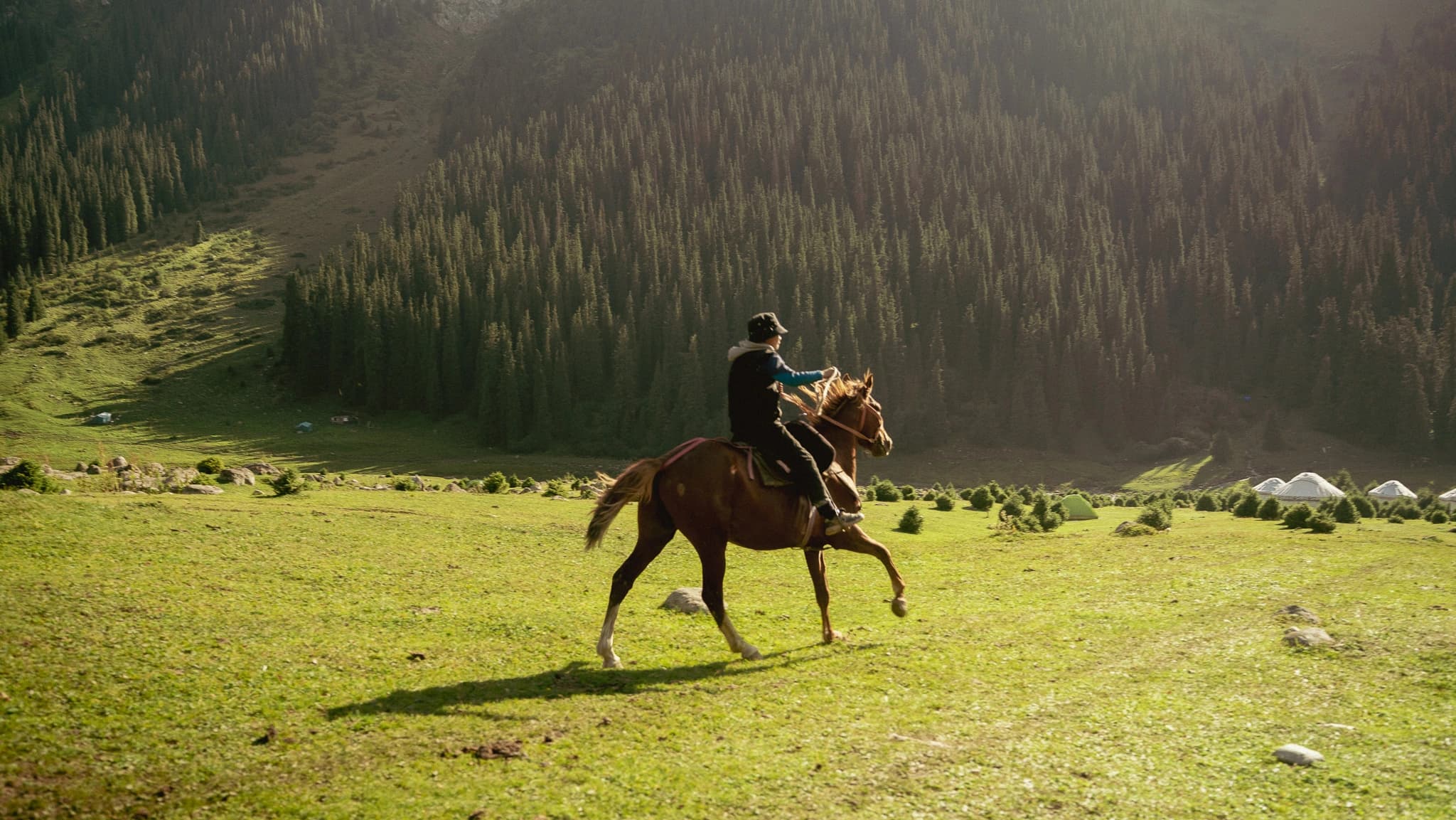 Altyn-Arashan valley with mountain backdrop