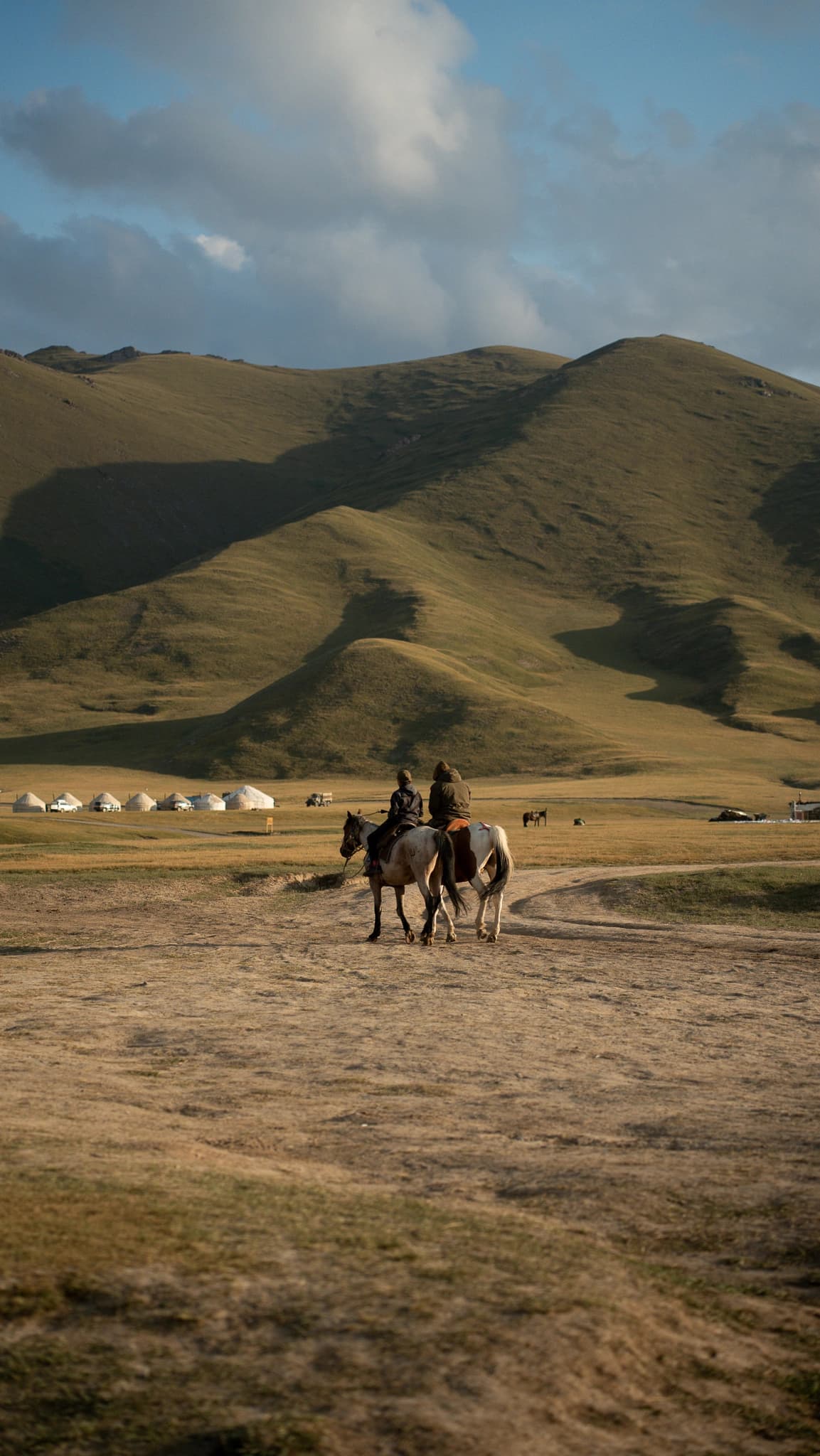 Towering red cliffs rising from the lake
