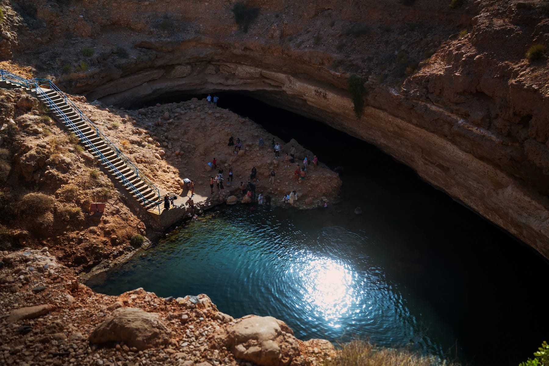 Turquoise water in Bimmah Sinkhole seen from above