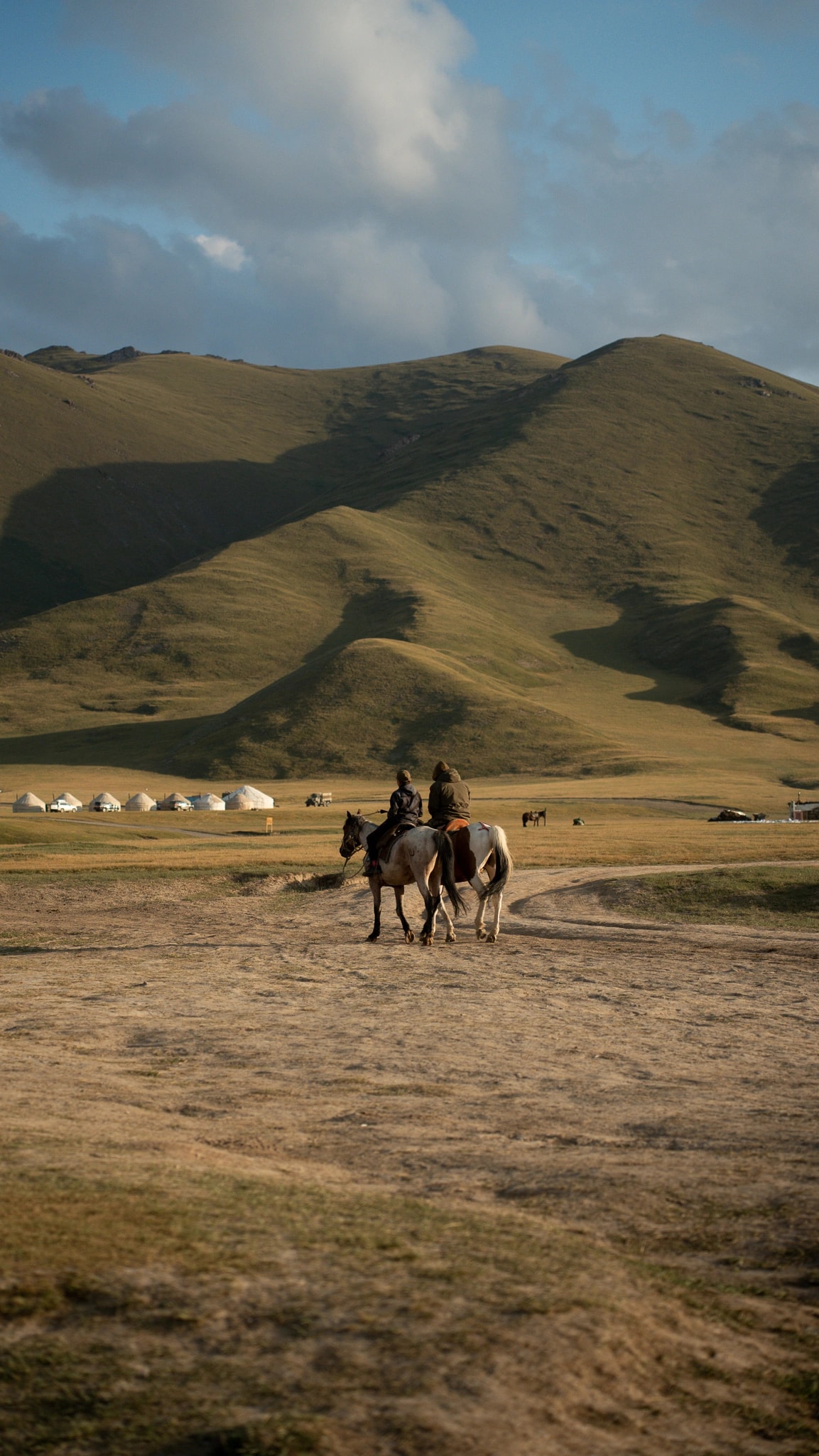 Towering red cliffs rising from the lake